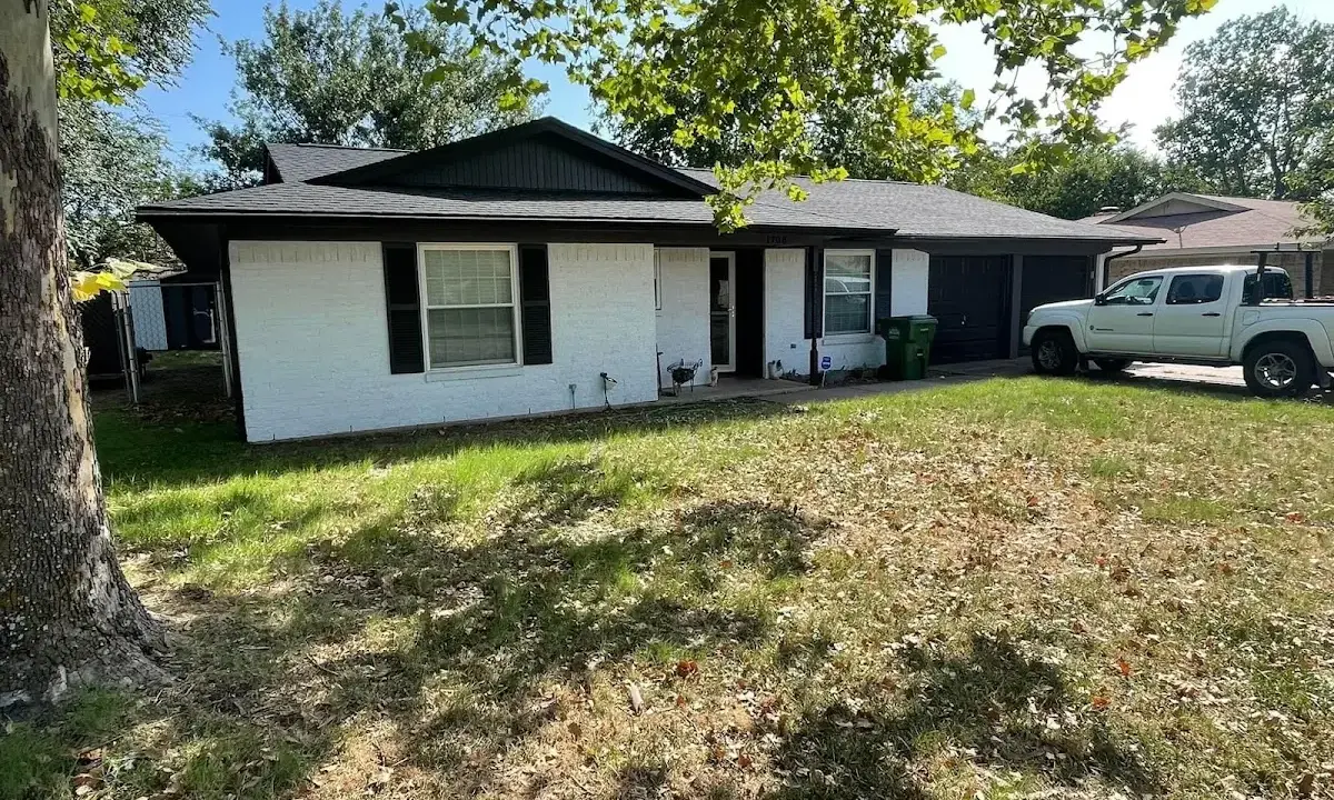 Professional roofing crew working on a residential roof in Dale City